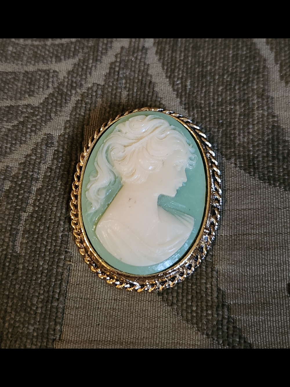 Gold Tone White Cameo Brooch with Mint Background